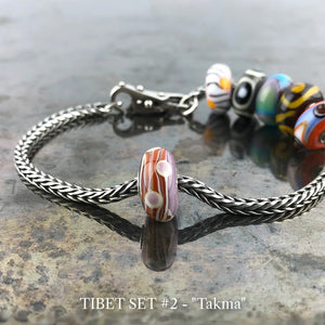Now available at Suzie Q Studio, the ultra-rare Trollbeads Tibet Beads. This is the TAKMA bead in the Trollbeads Tibet Set #2.