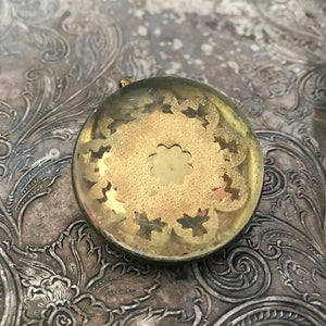 One-of-a-kind MY MOTHERS BUTTONS jewelry is handcrafted using the finest antique treasures. Glass-domed, Horse Bridle Rosettes were a decoration for horse bridles. The gold reflections turn this Pendant into the epitome of rustic elegance.