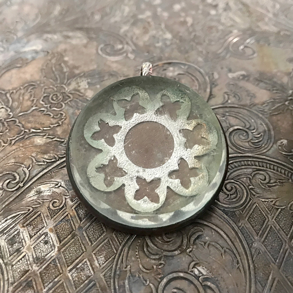 One-of-a-kind MY MOTHERS BUTTONS jewelry is handcrafted using the finest antique treasures. Bridle rosettes were a decoration for horse bridles. Purchase one of our Suzie Q Studio chains to make this pendant a necklace.