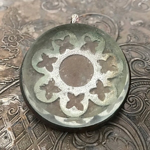 One-of-a-kind MY MOTHERS BUTTONS jewelry is handcrafted using the finest antique treasures. Bridle rosettes were a decoration for horse bridles. Purchase one of our Suzie Q Studio chains to make this pendant a necklace.