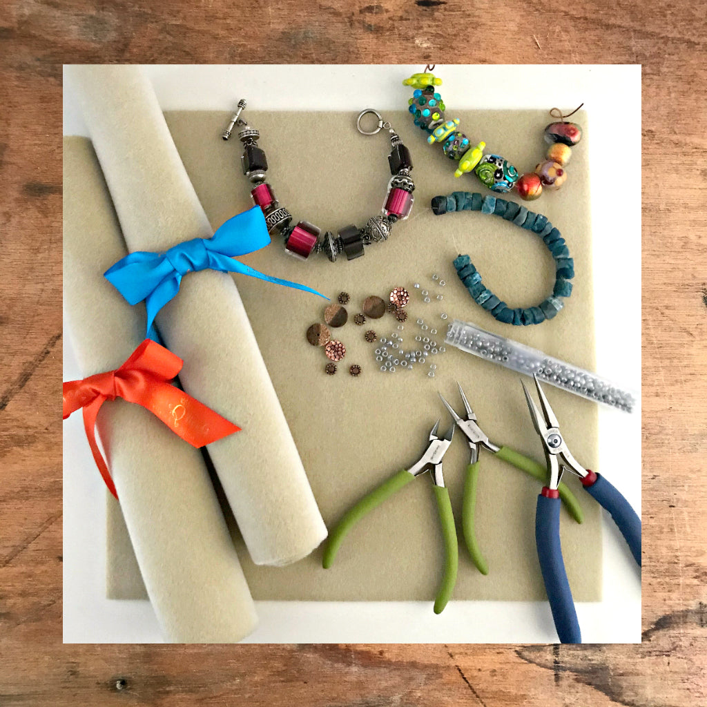 Suzie Q Studio's Velux Beading Mat is a wonderful working surface for jewelry designing and making because the beads don’t roll away and it’s comfy to work on! If you do a lot of bead weaving with seed beads, your working needle doesn’t get caught on the fabric.  It’s reversible and can be machine or hand washed.