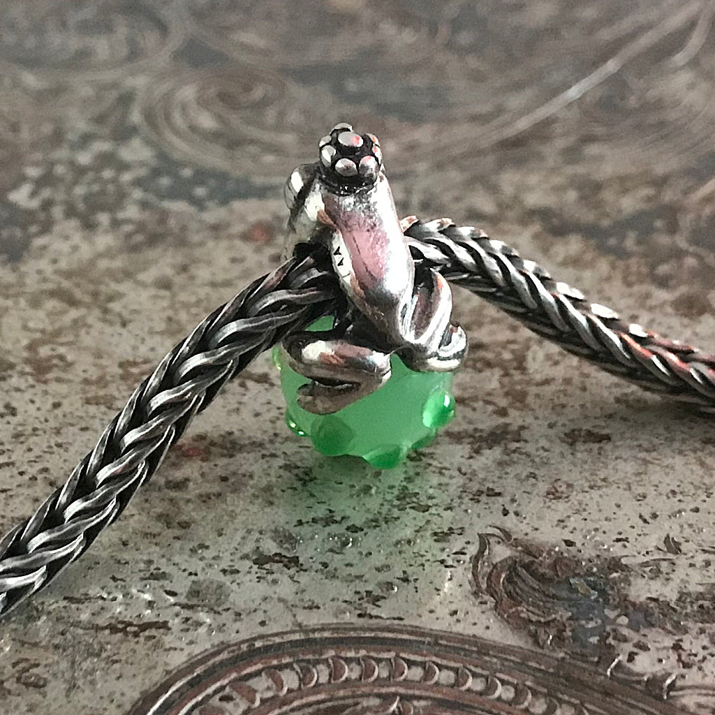 Suzie Q Studio has stashed away special glass, sterling silver and limited edition Trollbeads pieces in the Suzie Q Studio “Troll Treasures Vault”. This Trollbeads Retired Frog Prince Bead is a sweet beauty. We’re adding lots more to our Trollbeads Rare and Retired Collection so check back often!