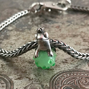 Suzie Q Studio has stashed away special glass, sterling silver and limited edition Trollbeads pieces in the Suzie Q Studio “Troll Treasures Vault”. This Trollbeads Retired Frog Prince Bead is a sweet beauty. We’re adding lots more to our Trollbeads Rare and Retired Collection so check back often!