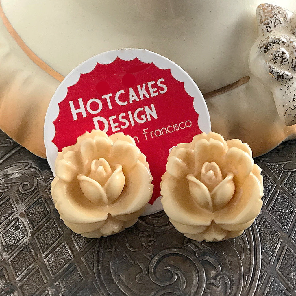 Suzie Q Studio carries HOTCAKES DESIGN retro-style, handmade jewelry taking its inspiration from classic Bakelite jewelry, vintage images and bold color. This pair of antique-style, carved-rose earrings is the perfect (and sweet) accent for almost any outfit, day or evening!