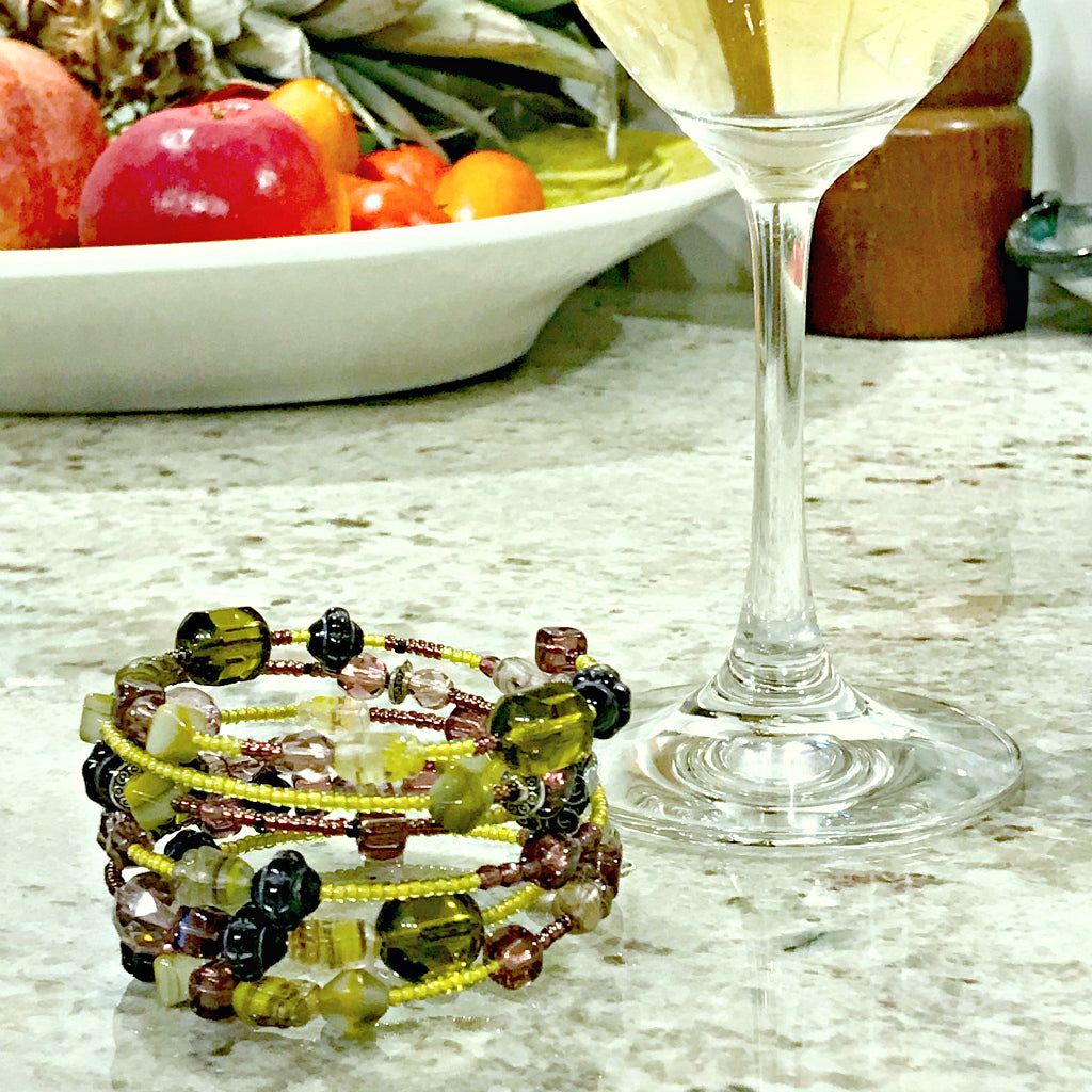 Suzie Q Studio's Serendipity BEAD STEW DIY EASY BRACELET MAKING KITS are limited edition collections of artfully curated premium quality beads and components for you to make a one-of-a-kind bracelet(s). No experience needed! The "Wine & Avocado Toast" Kit contains various shades of yellow-green, such as “olive” and “avocado", warm grey and purples.