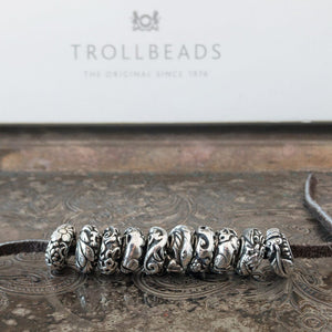 Now available at Suzie Q Studio, the complete set of 10  Trollbeads China Limited Edition Sterling Silver Beads. All NEW stock and never worn.
