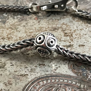 Suzie Q Studio has stashed away special glass, sterling silver and limited edition Trollbeads pieces in the Suzie Q Studio “Troll Treasures Vault”. This Trollbeads Retired Tupilak, Big Sterling Silver bead is a rare find. We’re adding lots more to our Trollbeads Rare and Retired Collection so check back often!