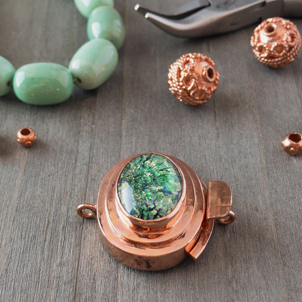 The harlequin metallic-effect of this vintage glass cabochon is magical, and this blue-green version is exquisite!  This copper box clasp was individually handcrafted in 100% pure copper, exclusively for Suzie Q Studio.
