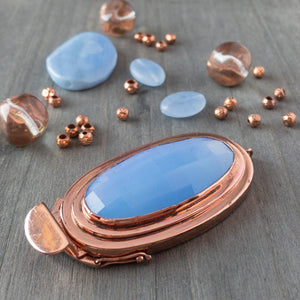 Copper and periwinkle blue is an absolutely stunning colour combo! This dramatic, elongated oval-shaped, box clasp was individually handcrafted in 100% pure copper, exclusively for Suzie Q Studio.