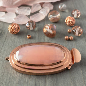 Featuring a scrumptious, pink opal-effect, faceted, vintage glass cabochon, the elongated oval-shape of this box clasp is truly striking! It was individually handcrafted in 100% pure copper, exclusively for Suzie Q Studio.