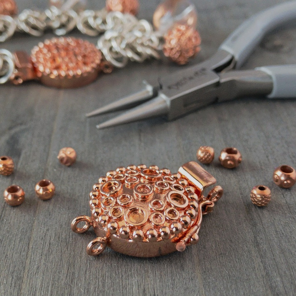 This circle and dot pattern gives this single-strand clasp a whimsical, happy look, suitable for all kinds of jewellery designs. This copper box clasp was individually handcrafted in 100% pure copper, exclusively for Suzie Q Studio.