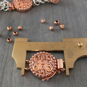 This circle and dot pattern gives this single-strand clasp a whimsical, happy look, suitable for all kinds of jewellery designs. This copper box clasp was individually handcrafted in 100% pure copper, exclusively for Suzie Q Studio.