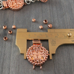 This circle and dot pattern gives this single-strand clasp a whimsical, happy look, suitable for all kinds of jewellery designs. This copper box clasp was individually handcrafted in 100% pure copper, exclusively for Suzie Q Studio.