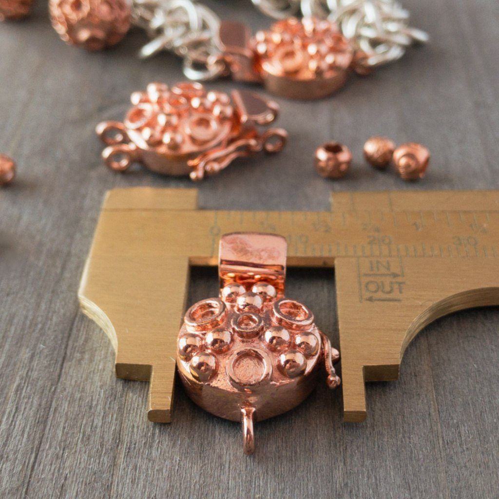 This circle and dot pattern gives this two-stranded clasp a whimsical, happy look, suitable for all kinds of jewellery designs. This copper box clasp was individually handcrafted in 100% pure copper, exclusively for Suzie Q Studio.