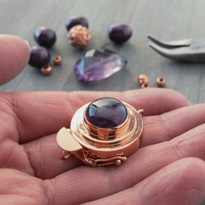 The amethyst-coloured, vintage glass cabochon in this unique box clasp has a delightful swirl of pale purple, and it was individually handcrafted in 100% pure copper, exclusively for Suzie Q Studio.