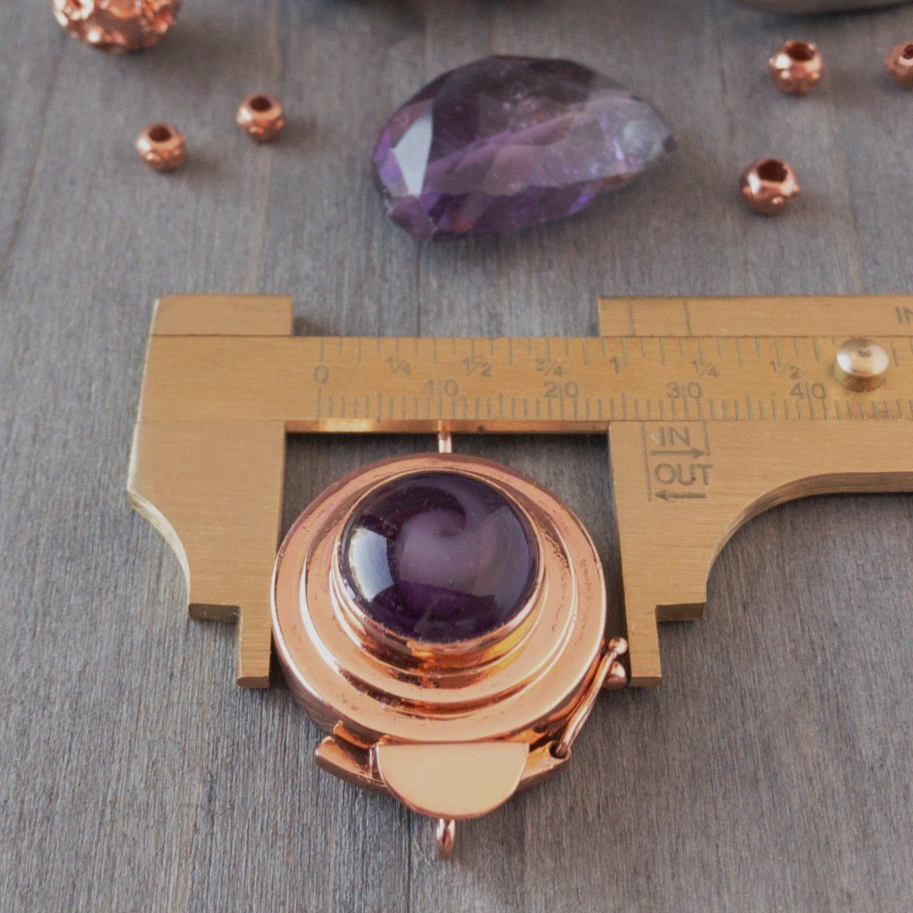 The amethyst-coloured, vintage glass cabochon in this unique box clasp has a delightful swirl of pale purple, and it was individually handcrafted in 100% pure copper, exclusively for Suzie Q Studio.