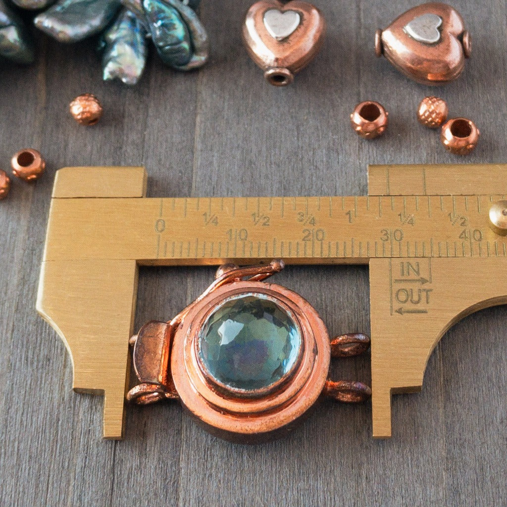 The natural antique patina on this clasp complements the ocean-coloured teal of this vintage glass cabochon beautifully, don't you think?! This copper box clasp was individually handcrafted in 100% pure copper, exclusively for Suzie Q Studio.