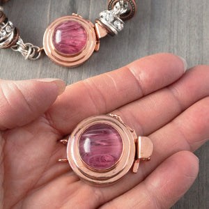 This unique, double strand, custom box clasp was individually handcrafted in 100% pure copper and features a pink-coloured, vintage glass cabochon for you to create a one-of-a-kind piece of extra-ordinary jewellery.