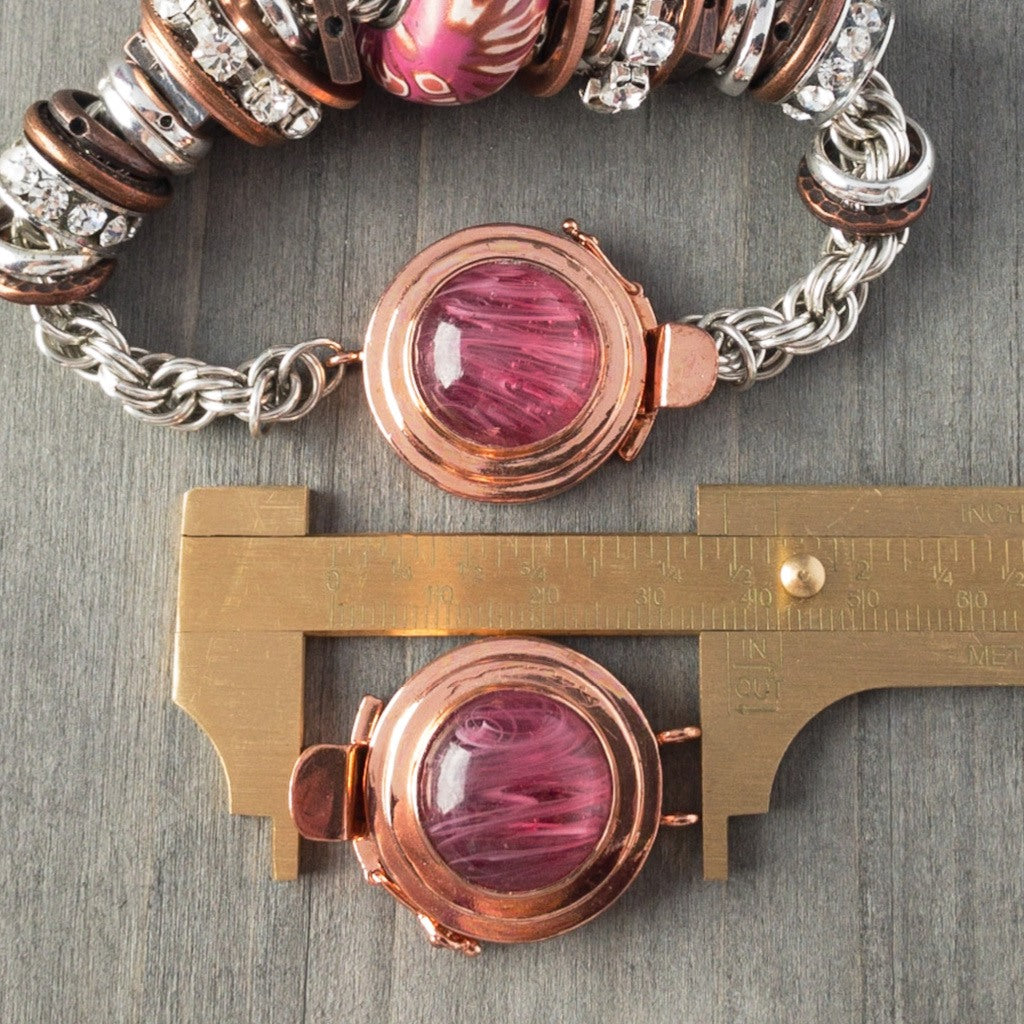 This unique, single strand, custom box clasp was individually handcrafted in 100% pure copper and features a lovely pink-coloured, vintage glass cabochon for you to create a one-of-a-kind piece of extra-ordinary jewellery.