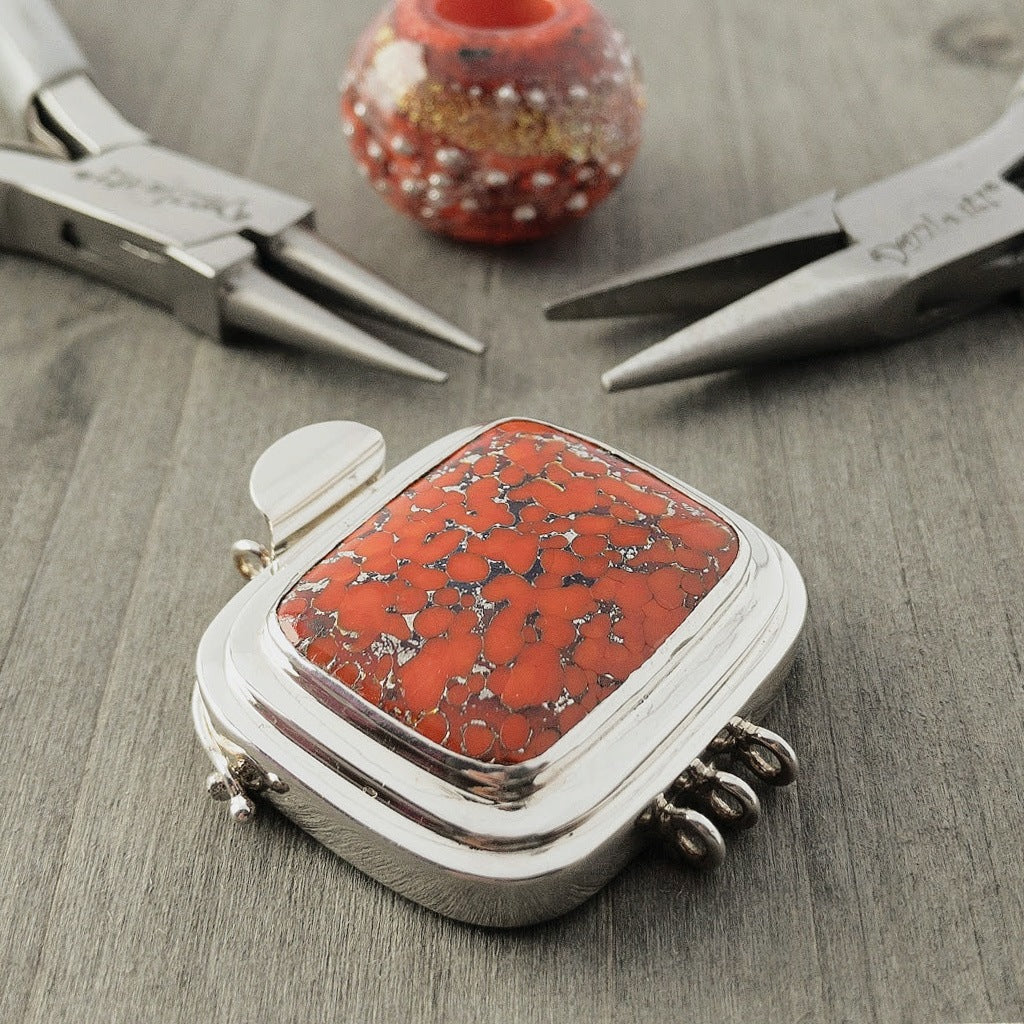 Whether you choose to design a more classic piece of jewellery or something more whimsically-fun, this tomato-orange, triple-strand, sterling silver box clasp will definitely make a statement!