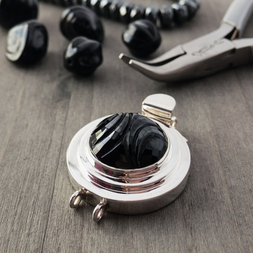 ​This double strand, sterling silver box clasp features an exquisite, jet black, “carved” vintage glass cabochon, which gives this fab closure a look that can be casual, classic or totally upscale... The choice is yours!