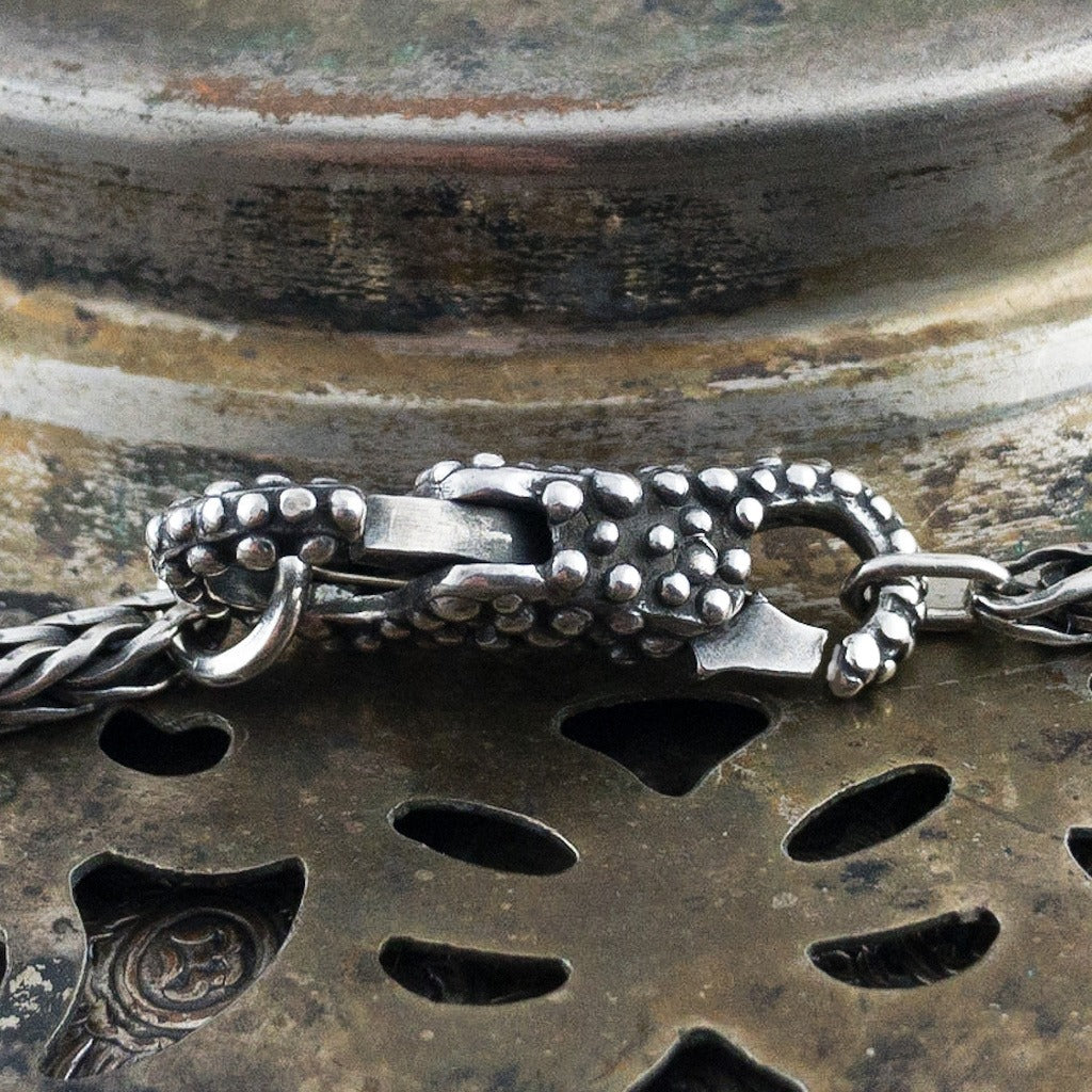 ​This item left the collection in 2019​.​  This beautiful lock/clasp was introduced with the Christmas 2012 collection, yet it is an everyday clasp and not holiday specific. The tiny buds that adorn this sterling silver clasp are a reminder of Spring and new growth.