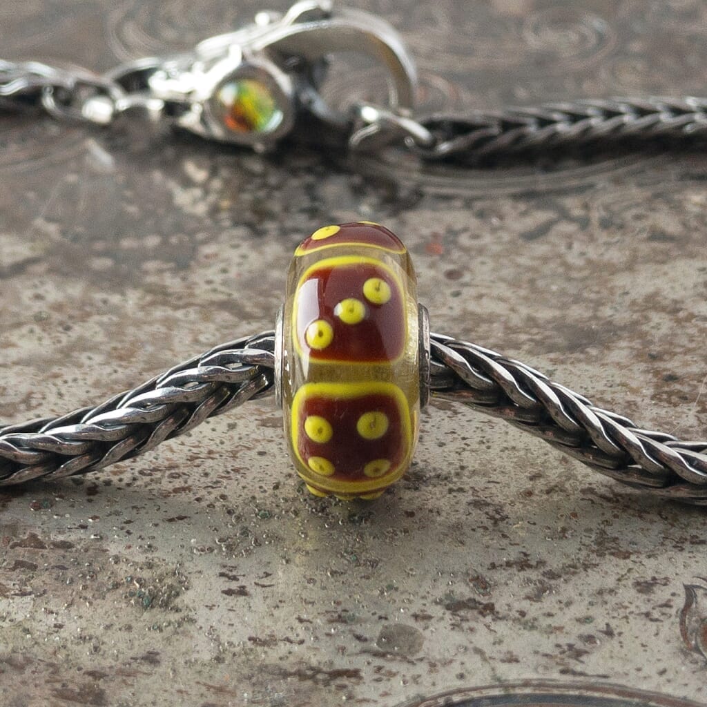 The rare and retired Trollbeads collection at Suzie Q Studio includes this one-of-a-kind Trollbeads Uniques glass "Dice" bead.