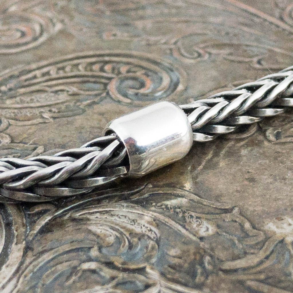 ​This Trollbead left the collection in 2008​.​  A time out from the hustle and bustle of life - or from the beads rolling back and forth on your bracelet. If you need a little space between beads, this can be useful.
